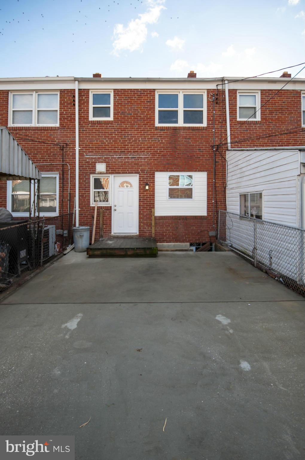 2159 Coralthorn Road Baltimore, MD 21220 - Photo 14 of 16 a front view of a building with a road