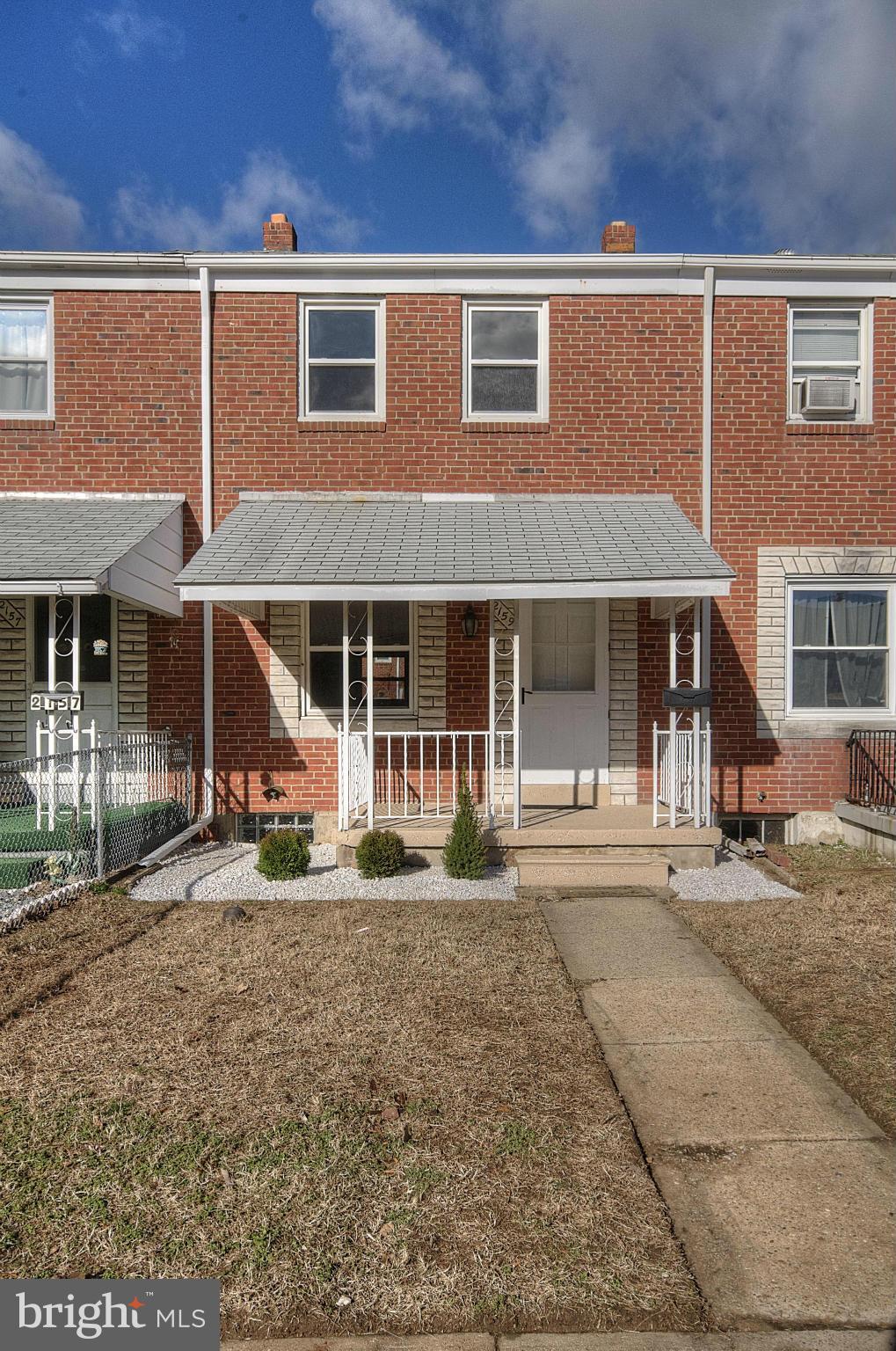 2159 Coralthorn Road Baltimore, MD 21220 - Photo 15 of 16 front view of a house with a yard