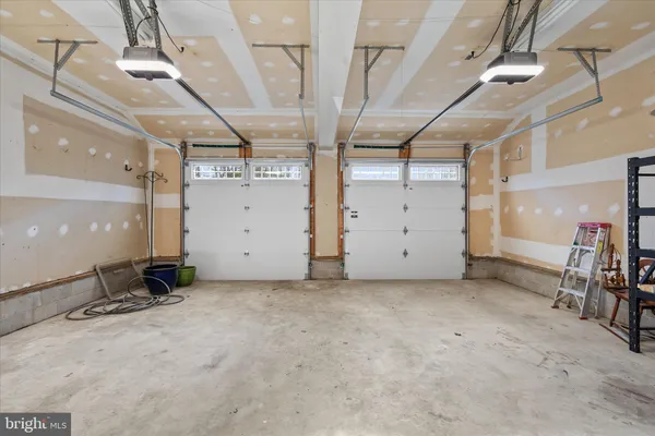 a view of a balcony with wooden floor