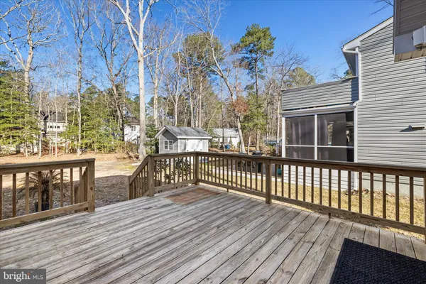 a balcony with wooden floor