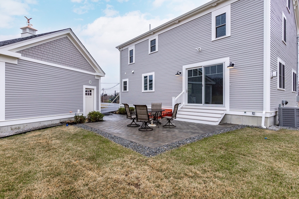 83 East Main Street Hopkinton, MA 01748 - Photo 36 of 42 a view of a house with patio