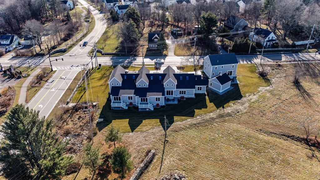 83 East Main Street Hopkinton, MA 01748 - Photo 42 of 42 a view of swimming pool with outdoor seating