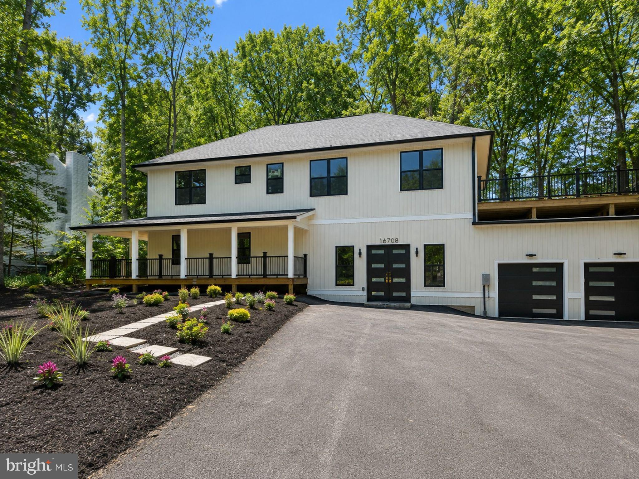 Modern home nestled in lush greenery.