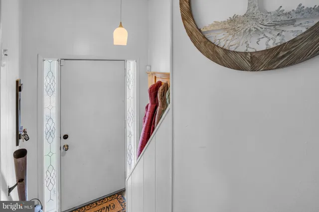 a view of a hallway with entryway