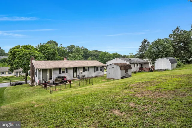 a view of a house with a big yard