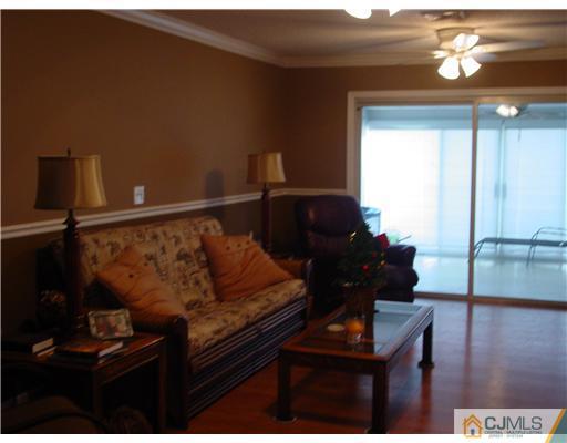 230 Convent Road Monroe Township, NJ 08831 - Photo 2 of 14 a living room with furniture