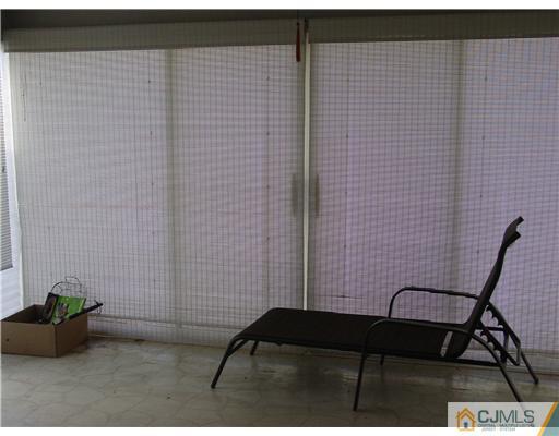 230 Convent Road Monroe Township, NJ 08831 - Photo 12 of 14 a view of a door with a chair
