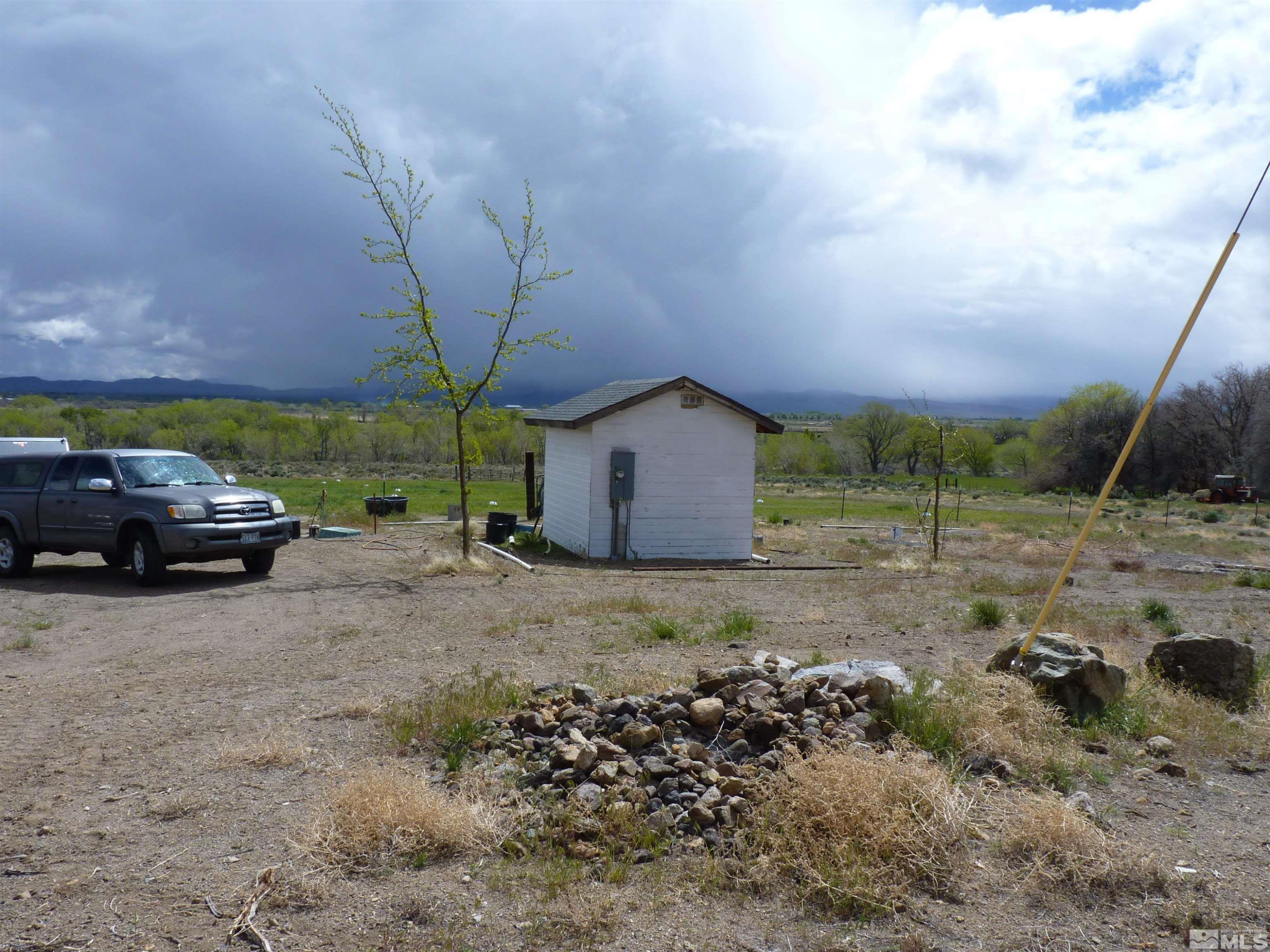 10 Lower Colony Road Wellington, NV 89444 - Photo 22 of 23 a view of a yard with car parked