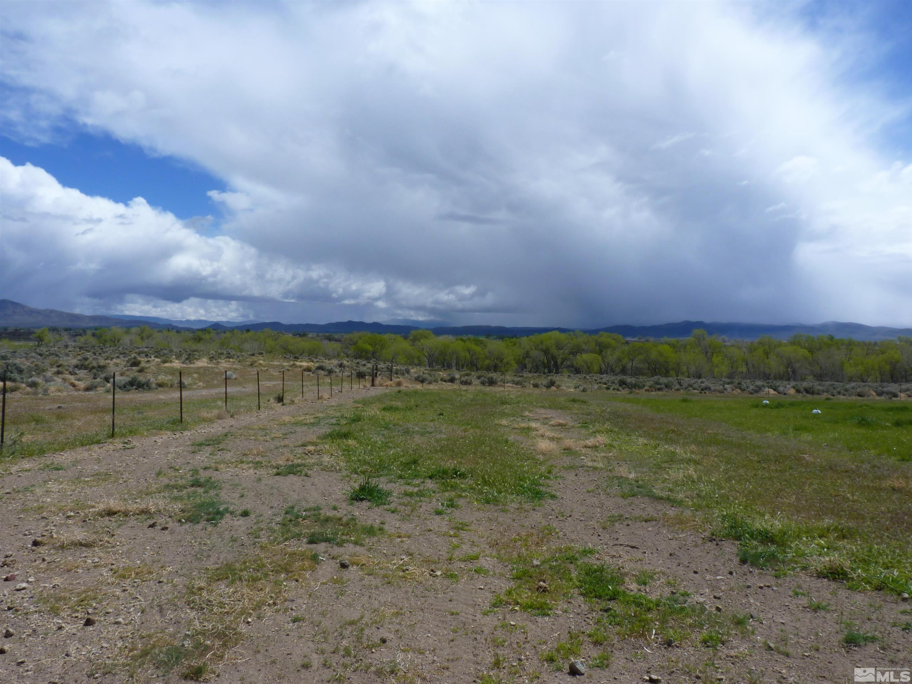 10 Lower Colony Road Wellington, NV 89444 - Photo 7 of 23 a view of a field with an ocean