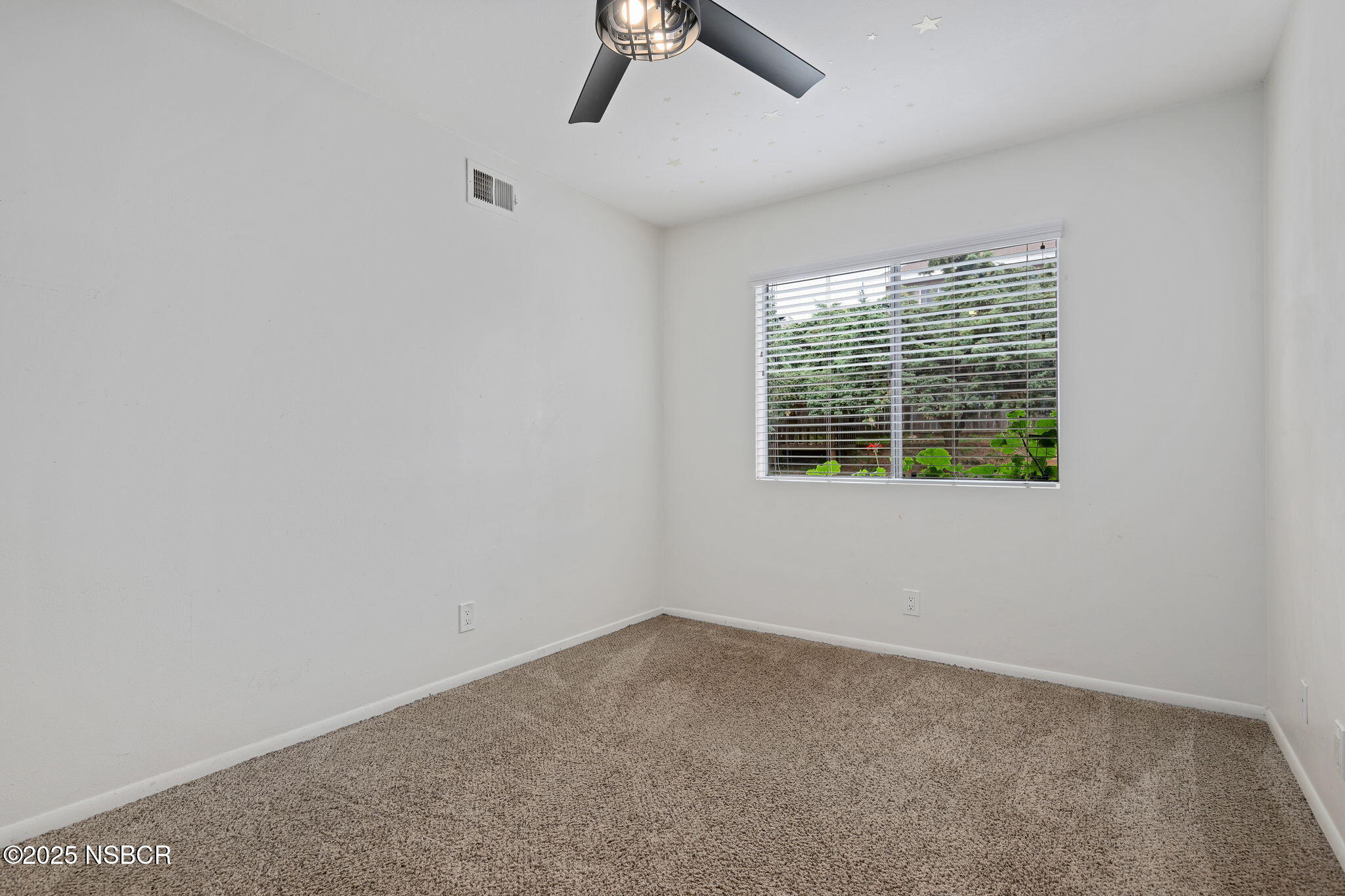 7344 Davenport Road Goleta, CA 93117 - Photo 14 of 21 an empty room with a window and a ceiling fan