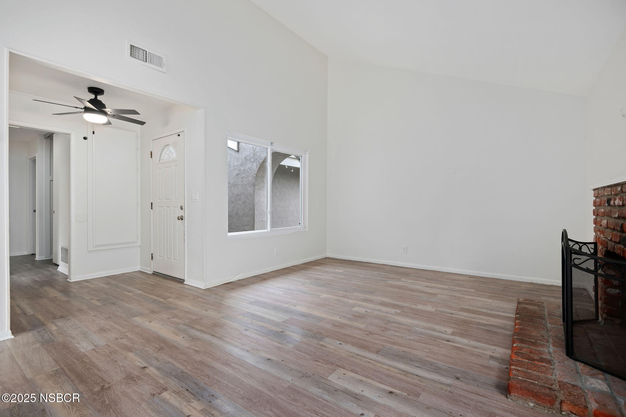 7344 Davenport Road Goleta, CA 93117 - Photo 6 of 21 wooden floor in an empty room with a window