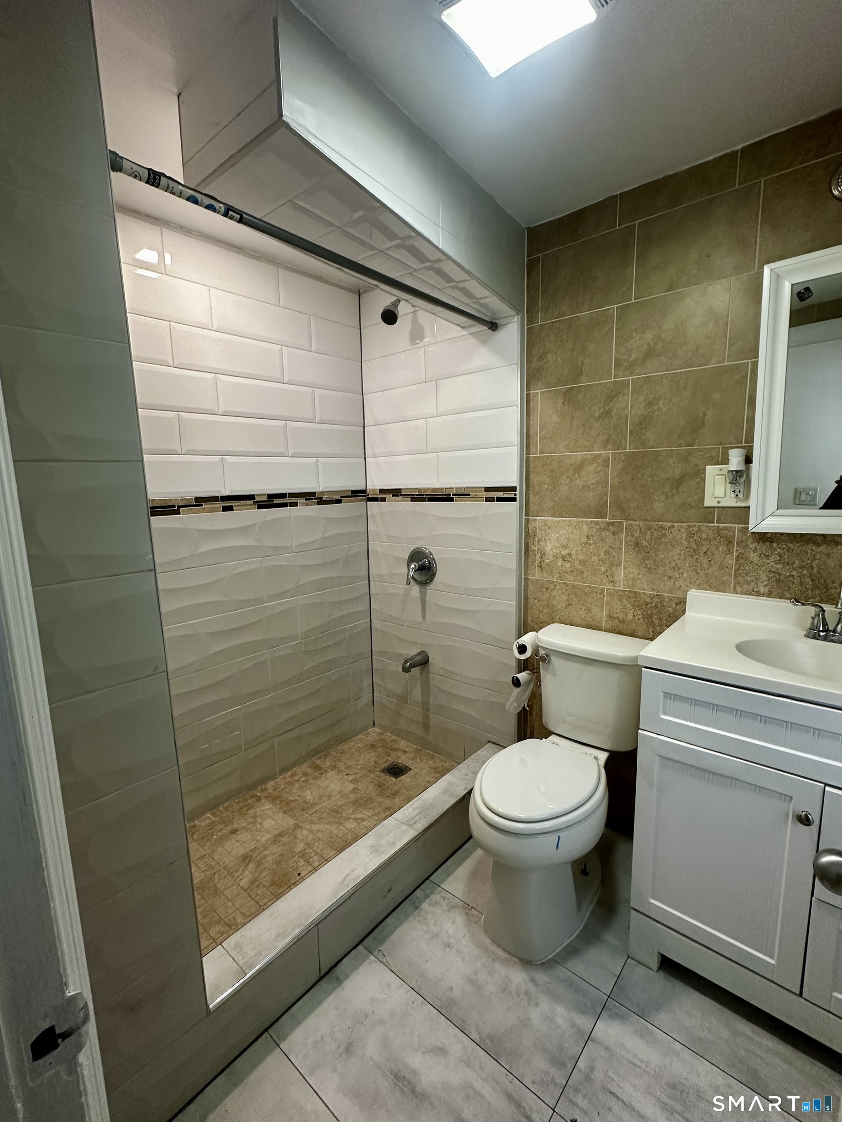 147 Helen Street, Unit 2 Bridgeport, CT 06608 - Photo 8 of 8 a bathroom with a sink and a toilet