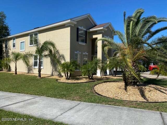 3301 Turkey Creek Drive Green Cove Springs, FL 32043 - Photo 2 of 36 a view of a house with a swimming pool