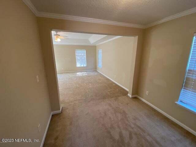 3301 Turkey Creek Drive Green Cove Springs, FL 32043 - Photo 21 of 36 a view of a small space with wooden floor and a window