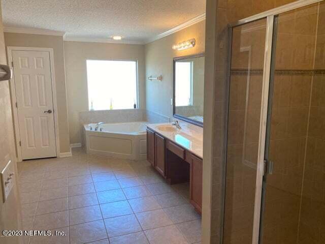 3301 Turkey Creek Drive Green Cove Springs, FL 32043 - Photo 23 of 36 a bathroom with a bathtub and shower