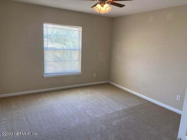 3301 Turkey Creek Drive Green Cove Springs, FL 32043 - Photo 27 of 36 an empty room with a window