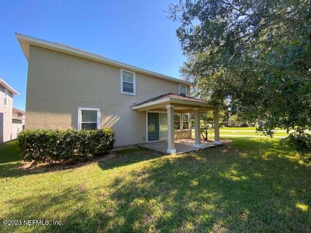 3301 Turkey Creek Drive Green Cove Springs, FL 32043 - Photo 31 of 36 a front view of house with yard and green space