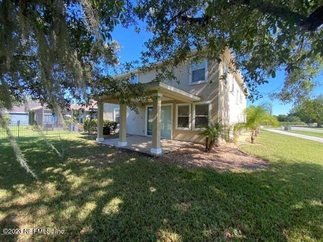3301 Turkey Creek Drive Green Cove Springs, FL 32043 - Photo 32 of 36 a view of a house with a yard