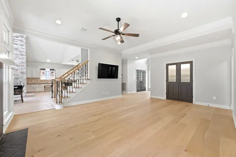 a view of an empty room with a fireplace