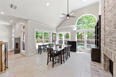 a kitchen with stainless steel appliances kitchen island granite countertop a sink and cabinets