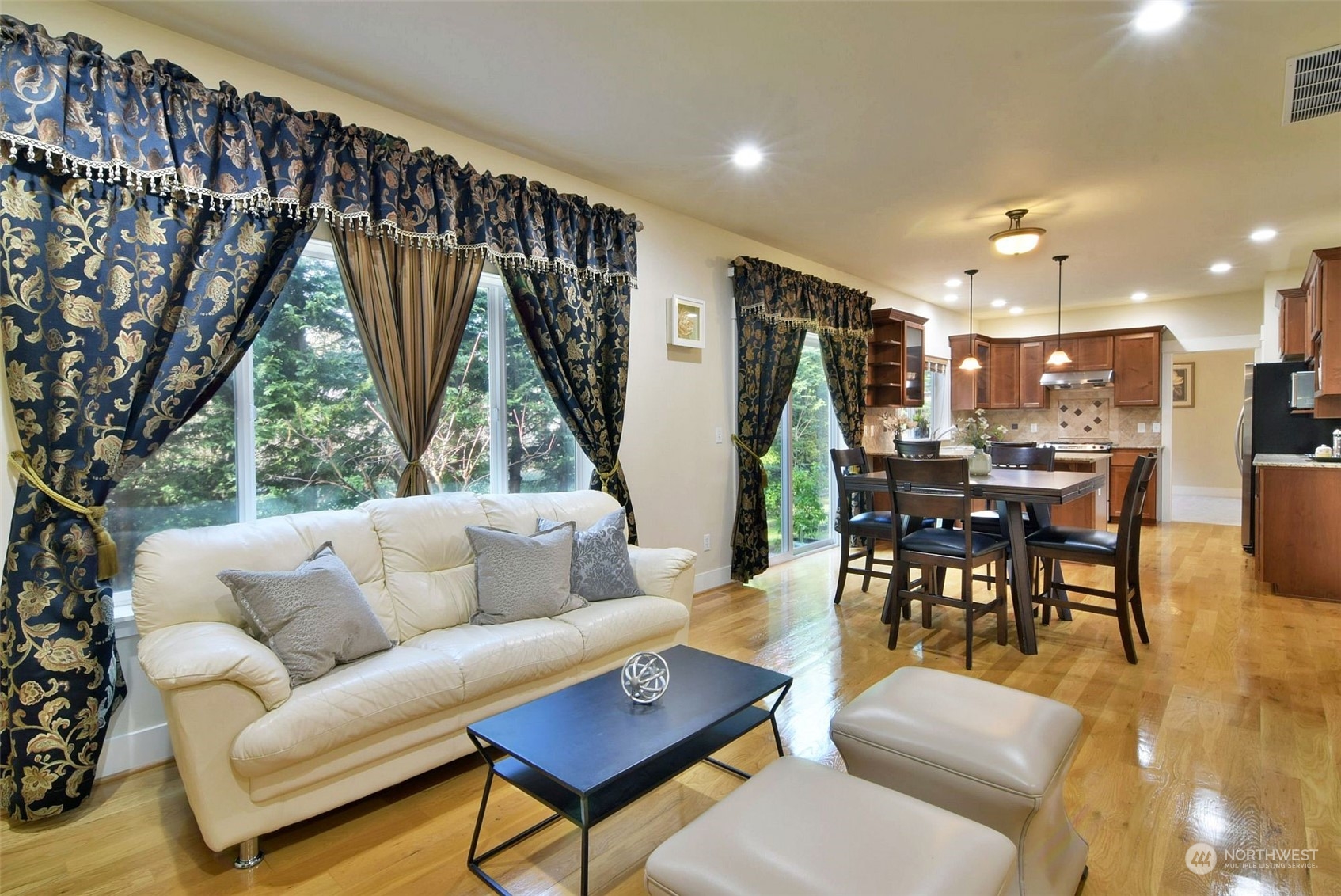 12 228th Street Southeast Bothell, WA 98021 - Photo 11 of 33 a living room with furniture and a large window