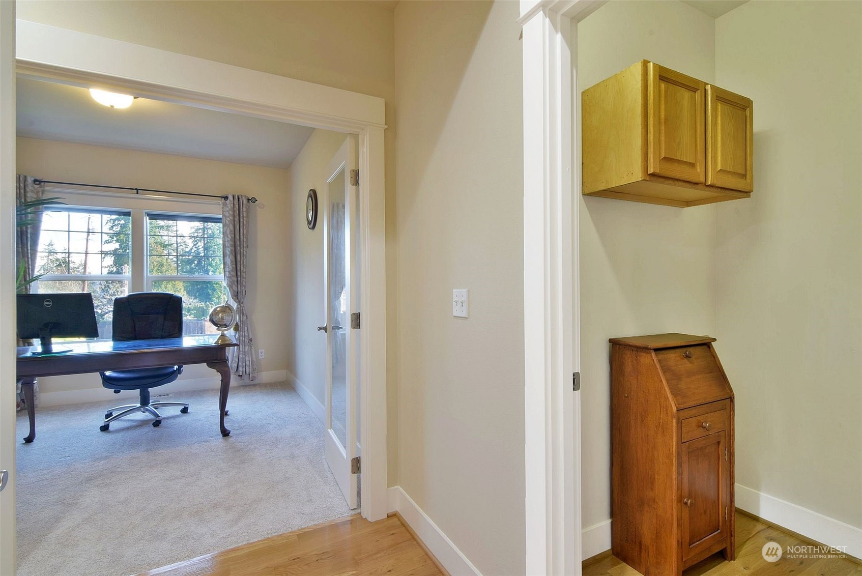 12 228th Street Southeast Bothell, WA 98021 - Photo 13 of 33 a view of a hallway with workspace and a window