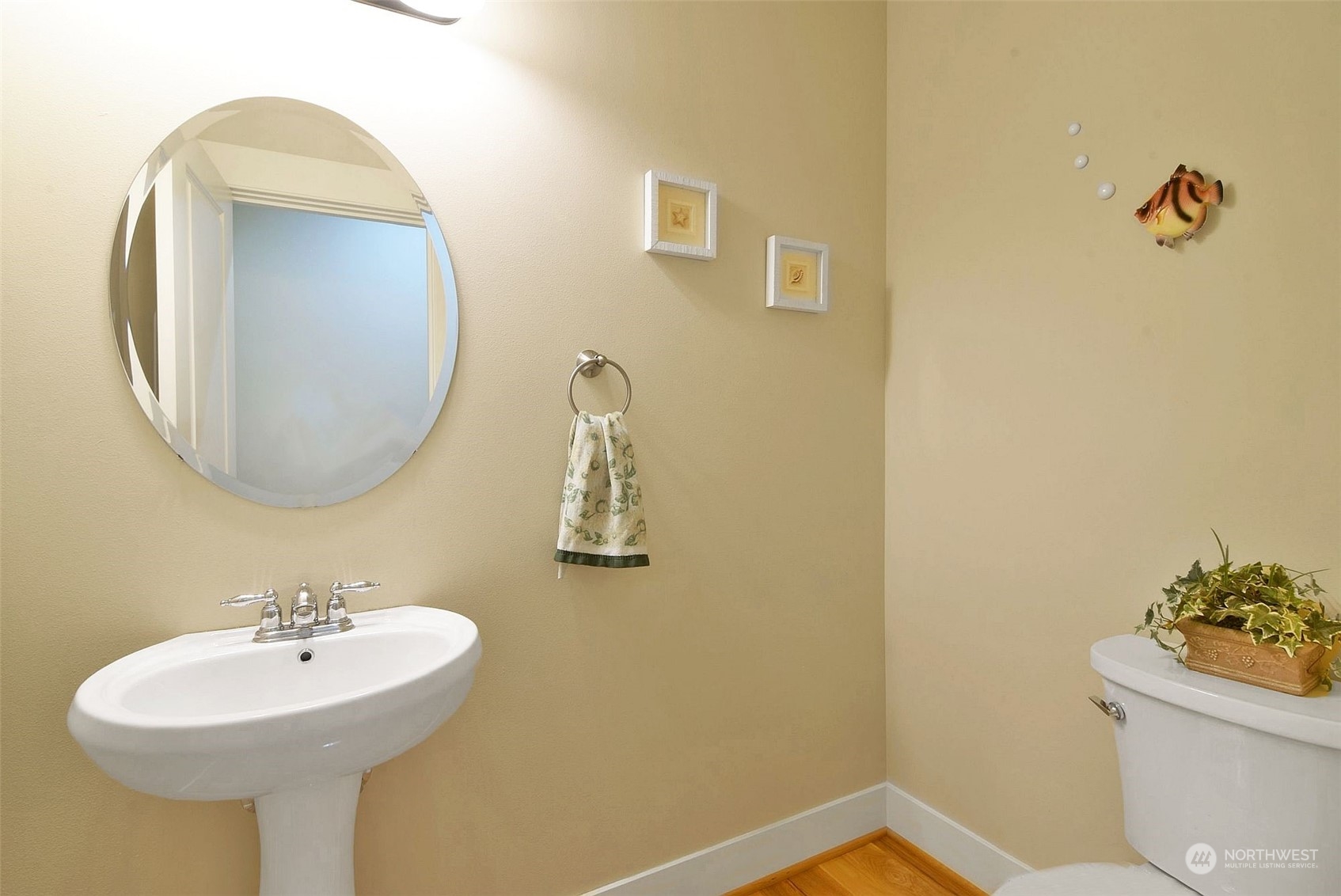 12 228th Street Southeast Bothell, WA 98021 - Photo 14 of 33 a bathroom with a sink a mirror and a toilet