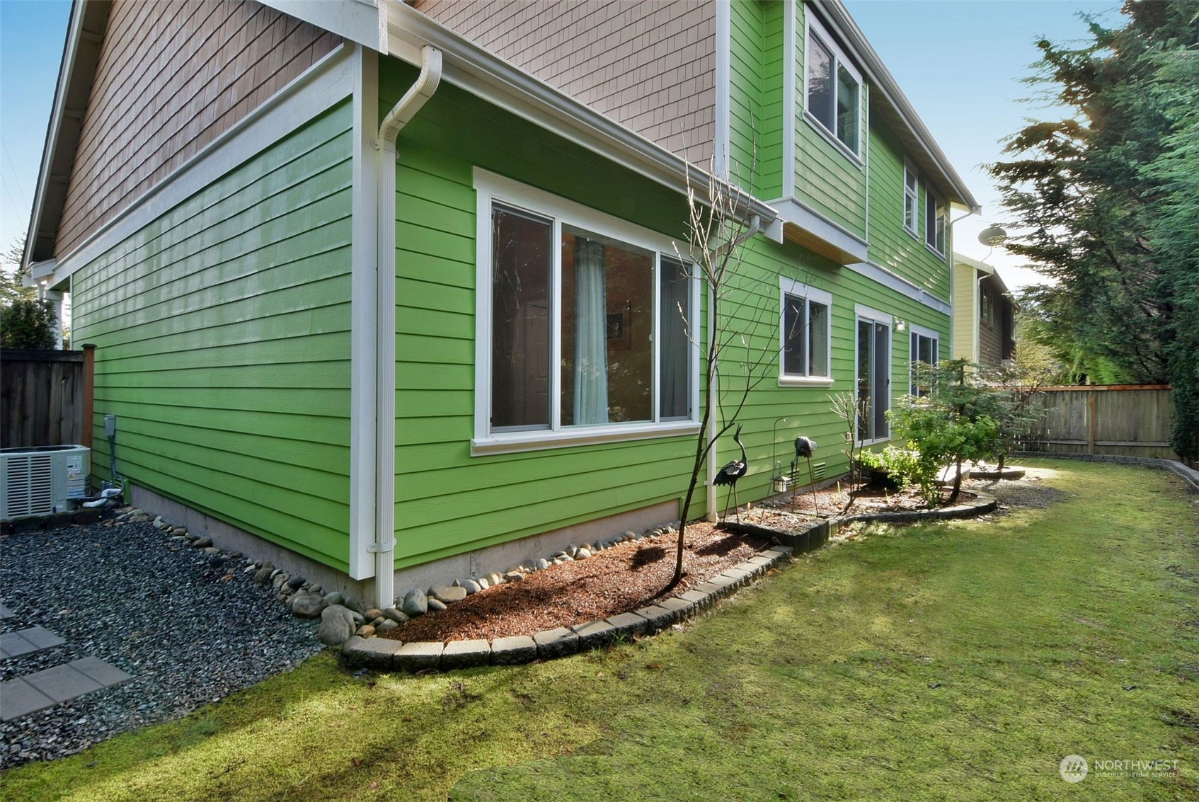 12 228th Street Southeast Bothell, WA 98021 - Photo 30 of 33 a front view of a house with a yard