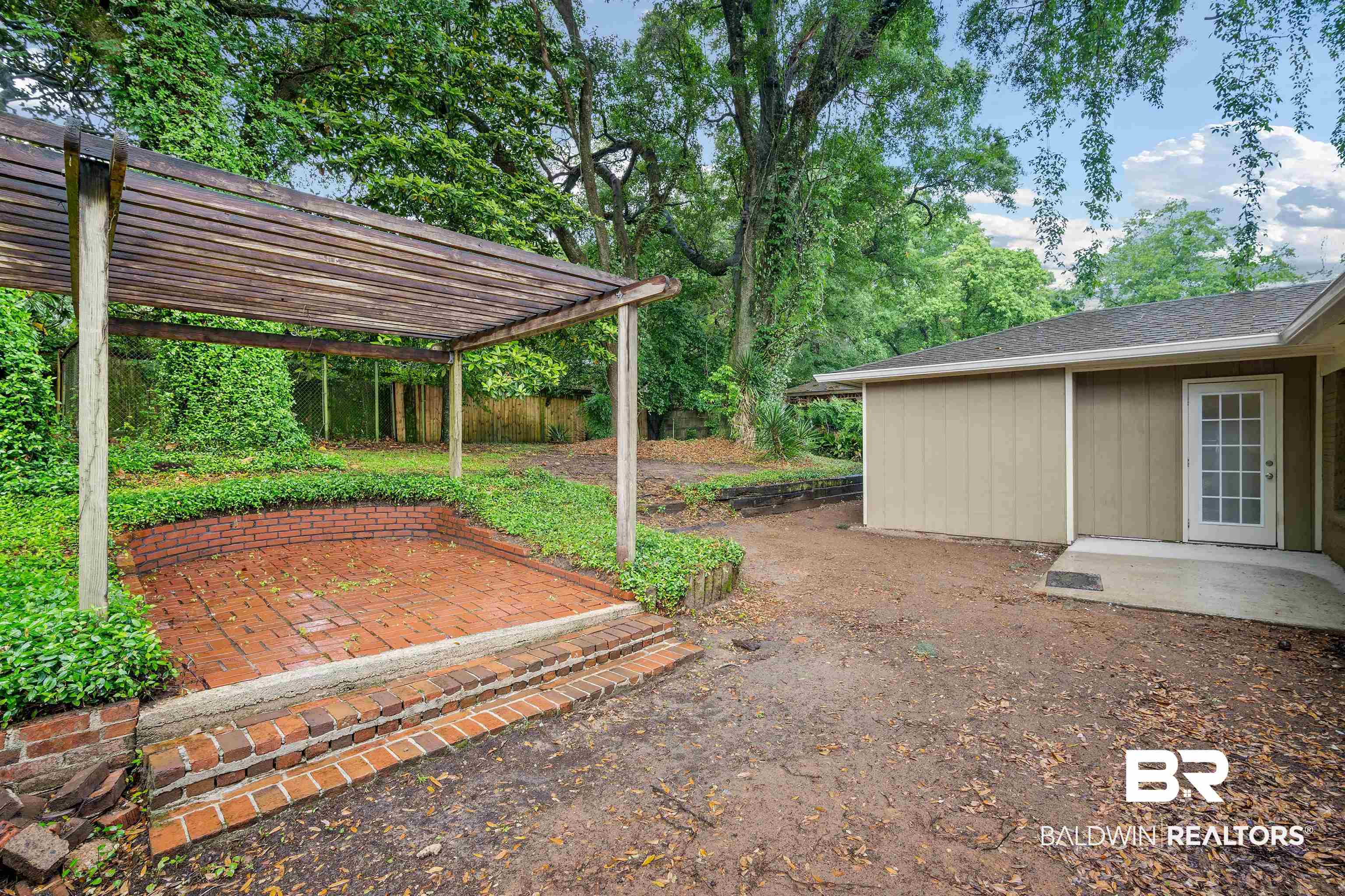 570 Markham Drive Mobile, AL 36609 - Photo 23 of 25 View of yard with a pergola and a patio