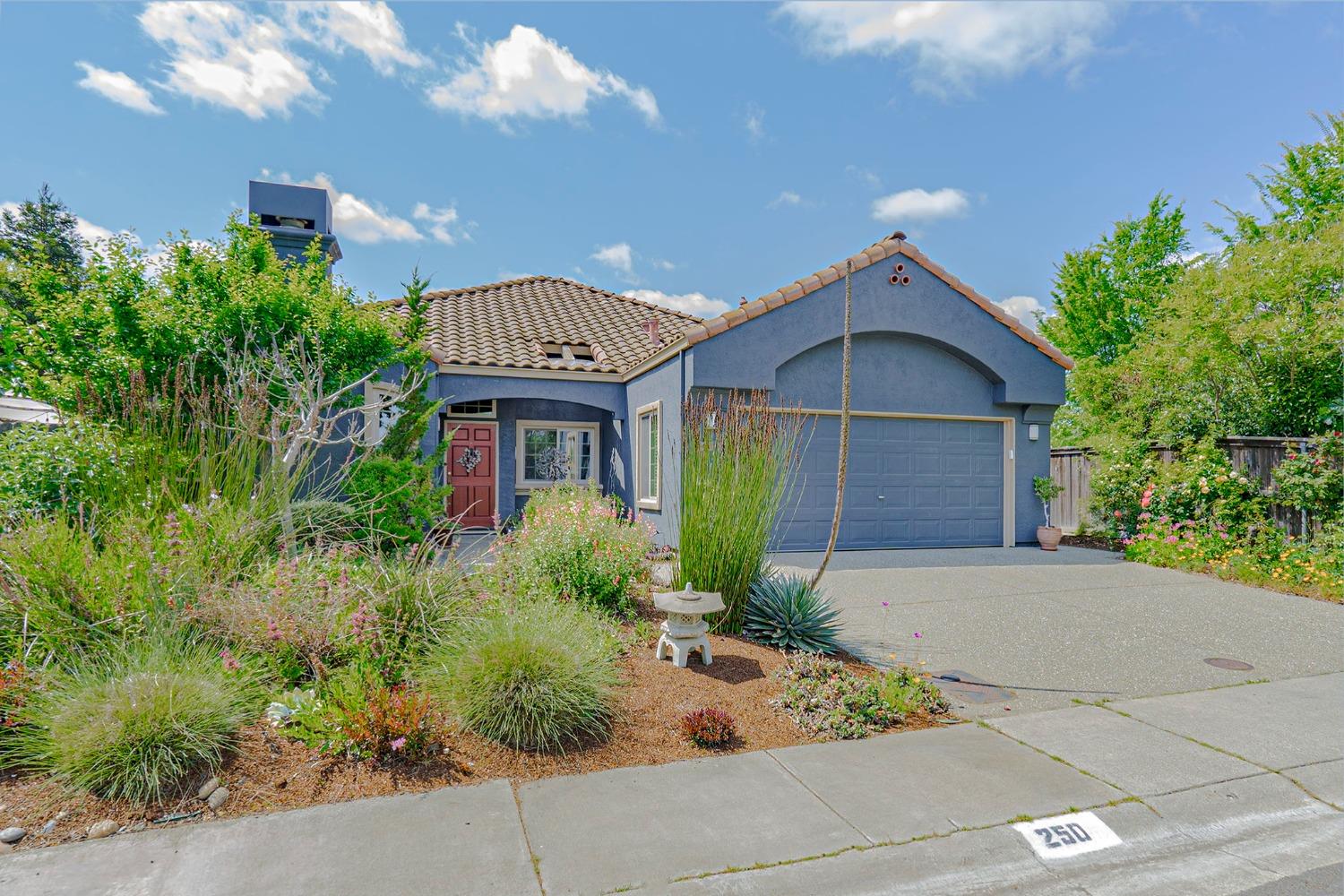 250 Tern Place Davis, CA 95616 - Photo 1 of 1 a front view of a house with garden