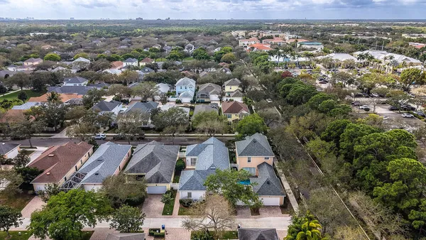 an aerial view of a city with lots of residential buildings