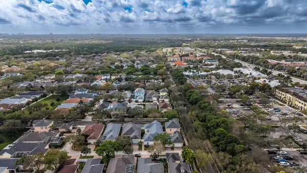 an aerial view of a city with lots of residential buildings