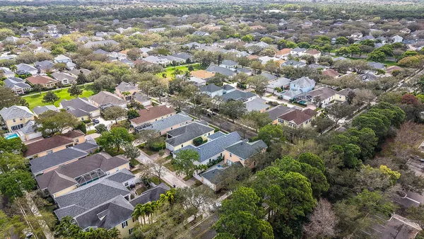 an aerial view of a city with lots of residential buildings