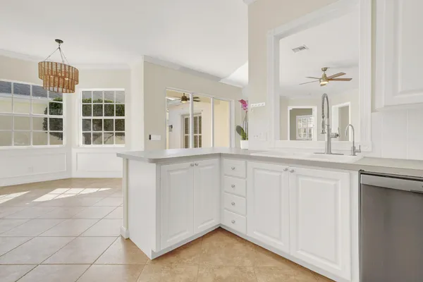 a bathroom with a sink vanity and a mirror