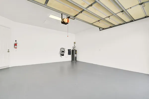 a view of a room with ceiling fan