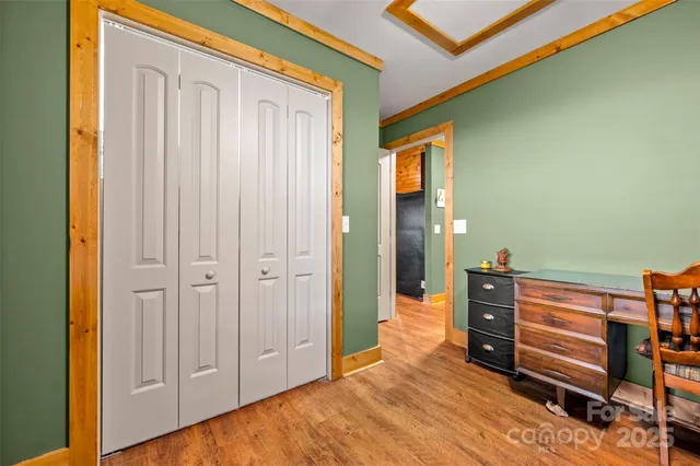 a view of room with stairs and furniture