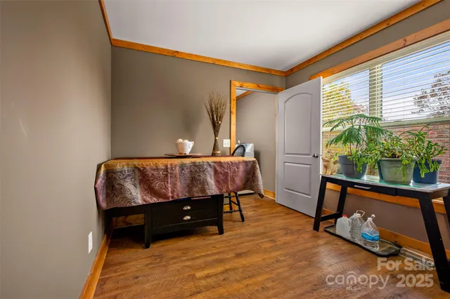 a room with a bed and a window