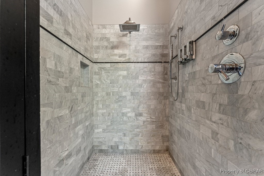 1106 Monarch Shores Road Kilmarnock, VA 22482 - Photo 27 of 44 Bathroom featuring a tile shower