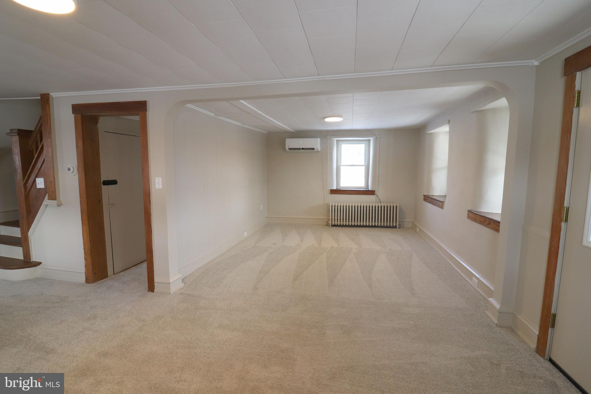 985 South Ridge Road Denver, PA 17517 - Photo 14 of 36 a view of empty room with wooden floor and fan