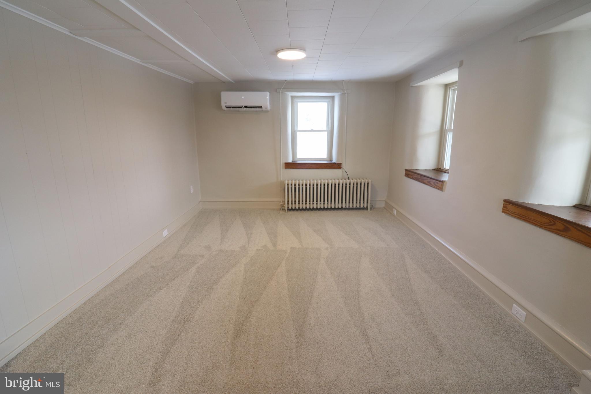 985 South Ridge Road Denver, PA 17517 - Photo 15 of 36 wooden floor in an empty room with a window