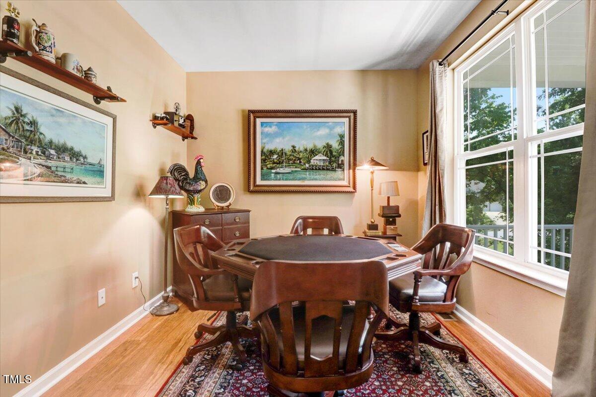 1304 Double Oak Lane Willow Spring, NC 27592 - Photo 8 of 46 a dining room with furniture and window