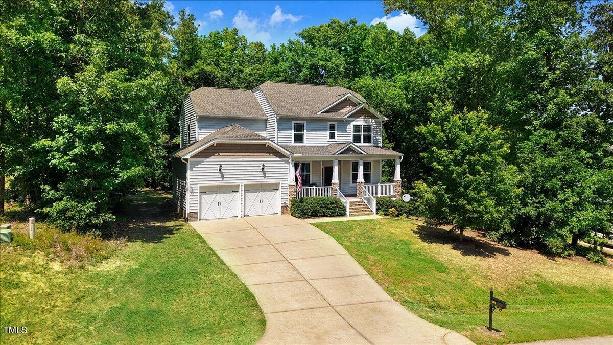 1304 Double Oak Lane Willow Spring, NC 27592 - Photo 6 of 46 a aerial view of a house with yard