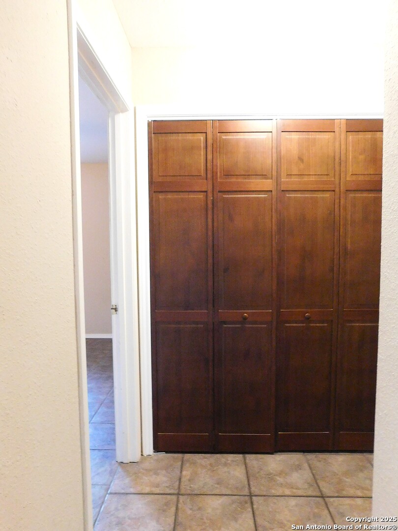 525 Cherry Ridge Floresville, TX 78114 - Photo 17 of 35 a bathroom with a shower