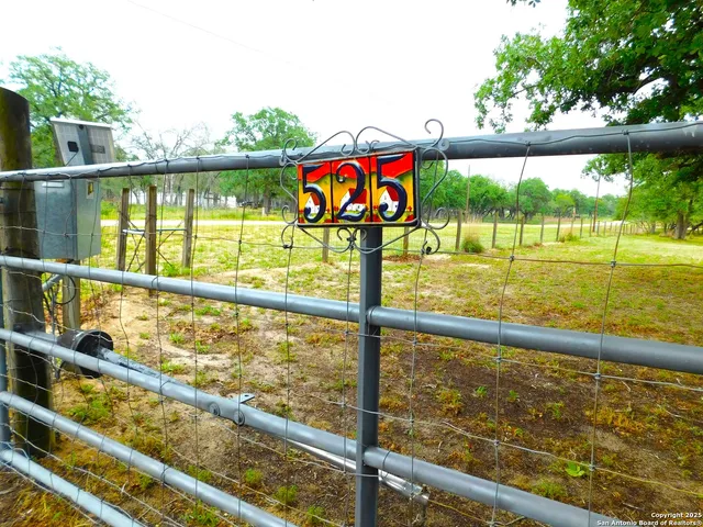 a view of swimming pool from a balcony
