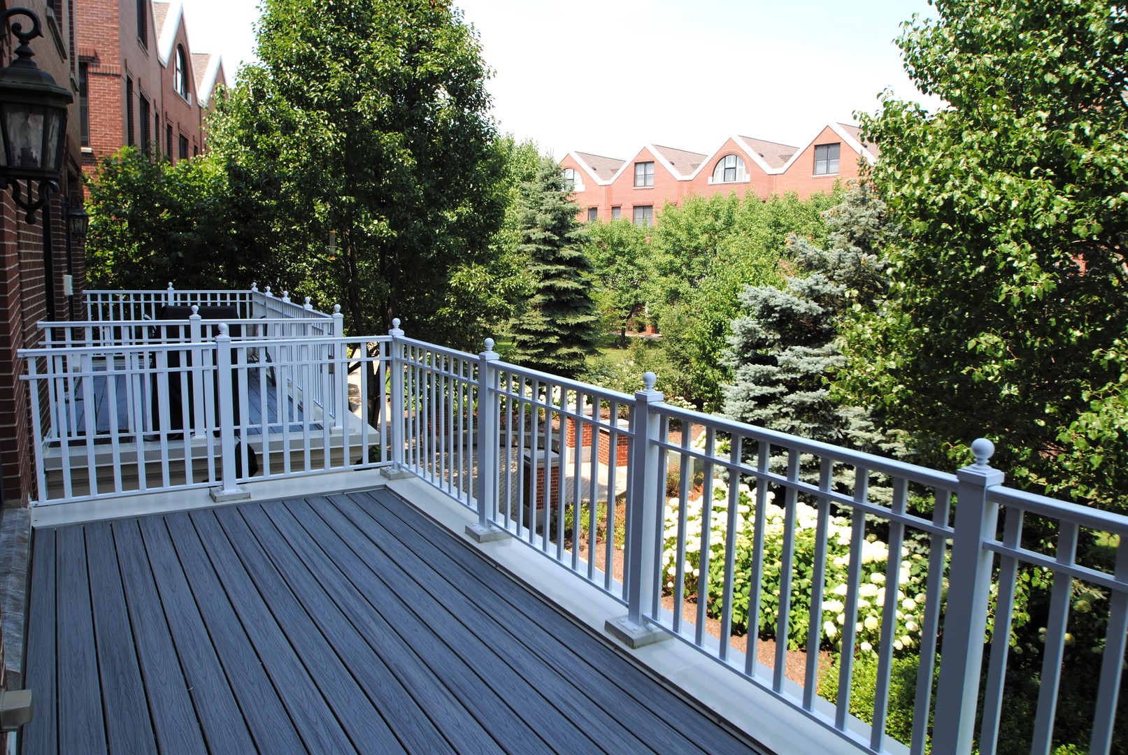 1802 Admiral Court Glenview, IL 60026 - Photo 18 of 18 a view of a balcony with wooden floor and fence
