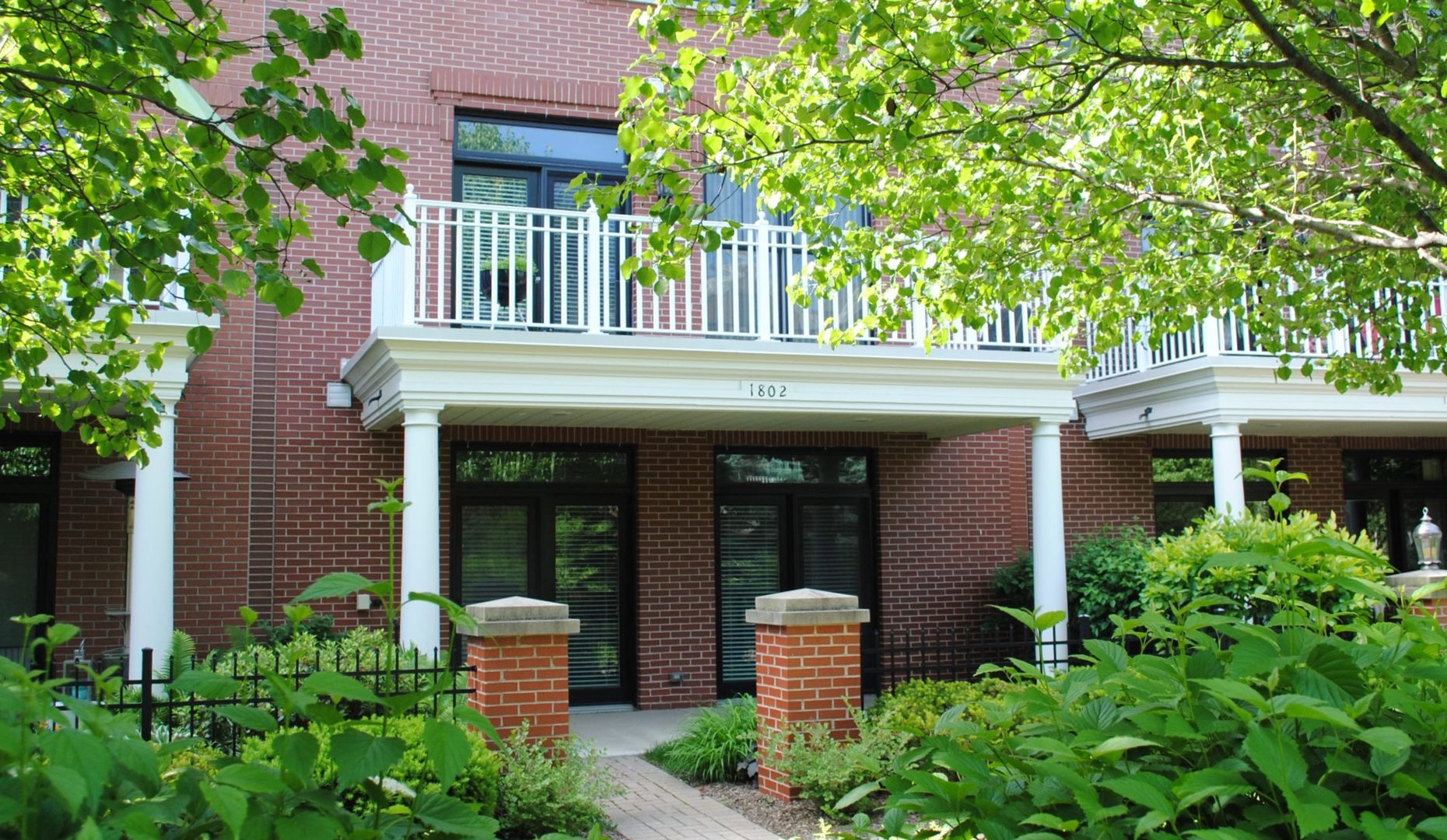 1802 Admiral Court Glenview, IL 60026 - Photo 4 of 18 a front view of a house with a garden
