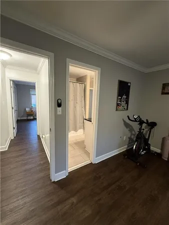 a view of a room with wooden floor bathroom