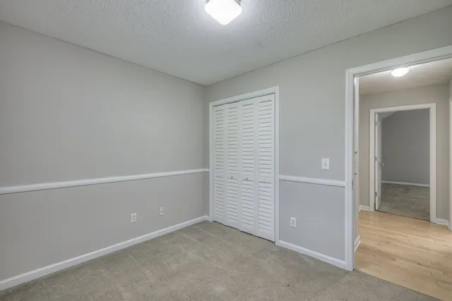 an empty room with closet