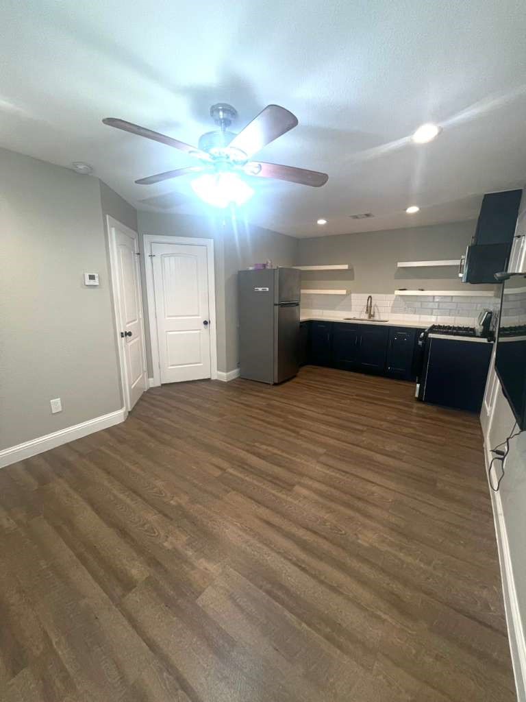 3807 Edison Street Houston, TX 77009 - Photo 4 of 11 a view of a livingroom with a flat screen tv