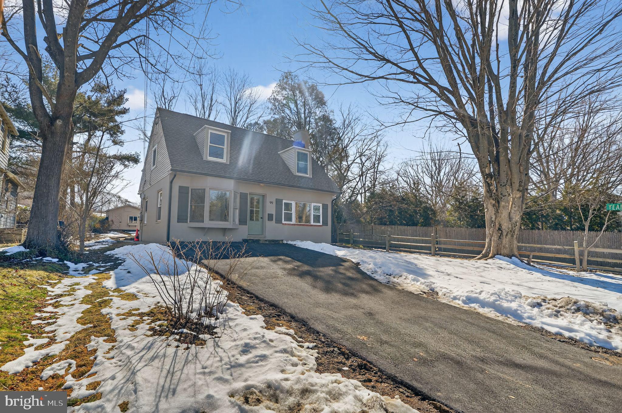 99 Rorer Street Glenside, PA 19038 - Photo 2 of 36 a front view of house with a yard covered in snow